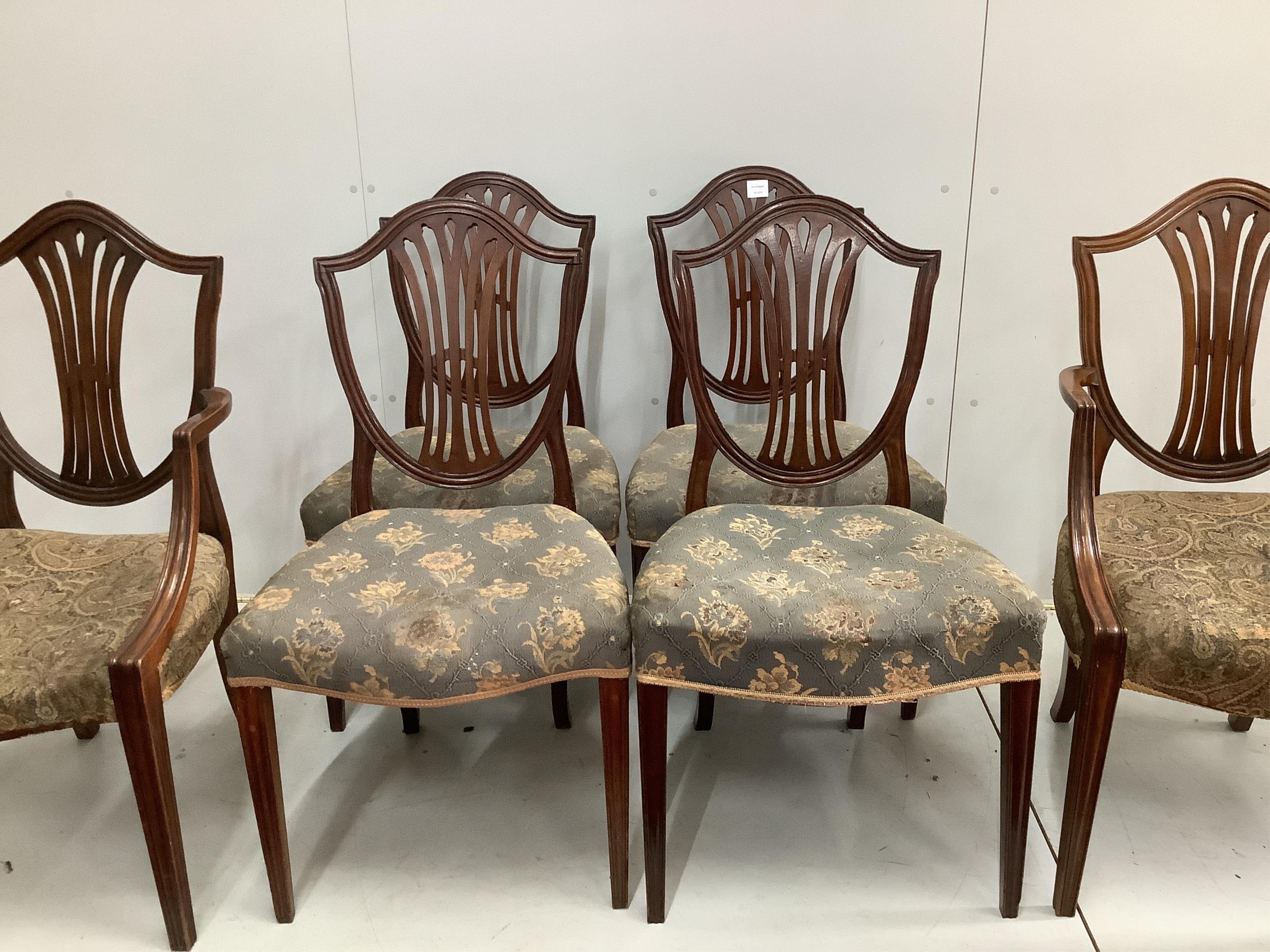 A set of six George III and later mahogany dining chairs, two with arms. Condition - fair